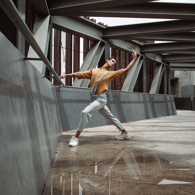 A person holding a challenging balance pose with grace.